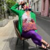 Handmade crochet Viola bag in vibrant purple and orange, crafted from Italian Lycra Fetucia yarn with a pearl handle – limited edition designer accessory by InaPavl.